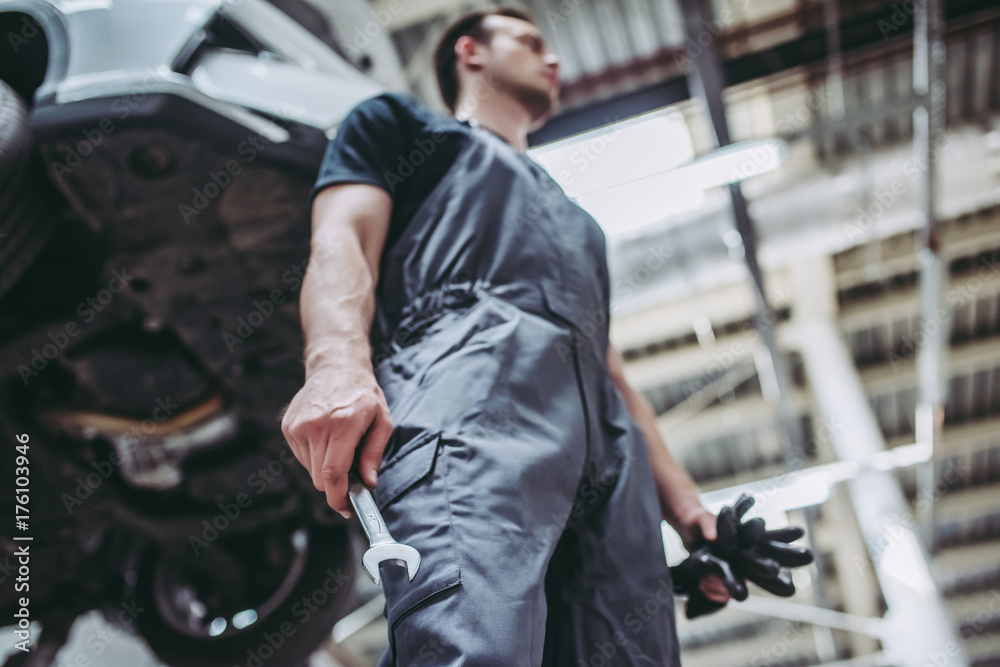 Fototapeta premium Handsome auto service mechanic