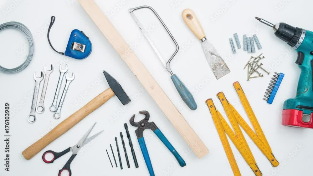 Top shot on DIY tools arranged on white background. 4k stop motion animation.