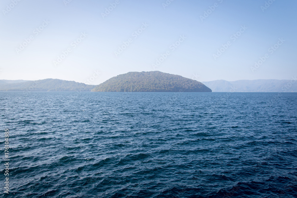 Scenic view of lake Towada with small islands, Aomori, Oirase Gorge, Japan