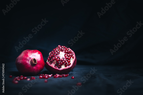 fresh pomegranate on a black background