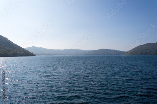 Scenic view of lake Towada with small islands, Aomori, Oirase Gorge, Japan © Claudia Prommegger