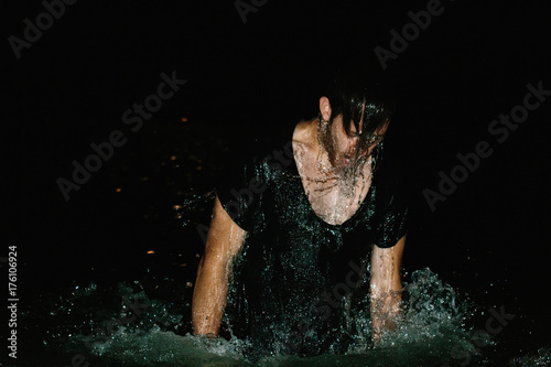 Man Rises Above Surface Of Dark Waters Gasping For Air