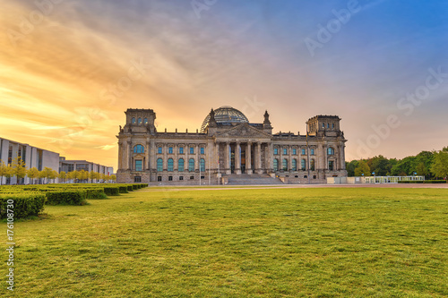 Berlin sunrise city skyline at Reichstag (German parliament building), Berlin, Germany photo