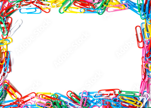 Colorful paperclips on white background. with copy space for your text message