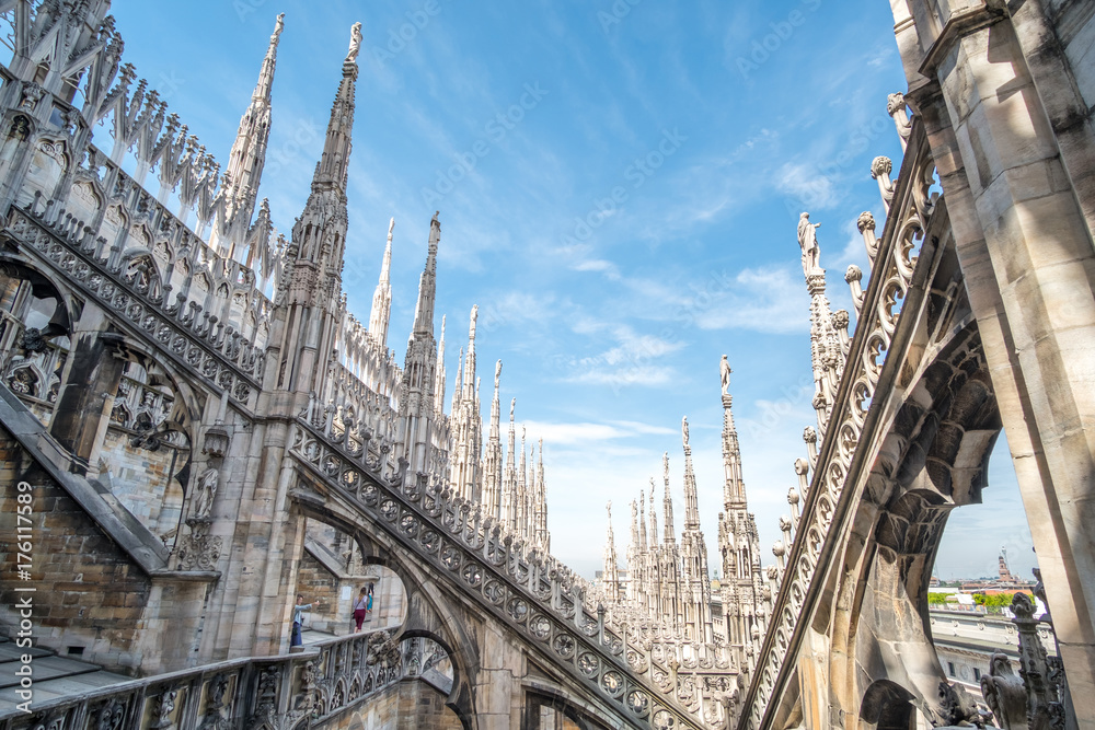 Detail of Milan Cathedral or Duomo di Milano, Gothic church located in the historical center of Milan, Italy.