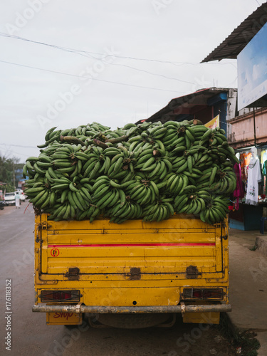 Truck overfull of bananas photo