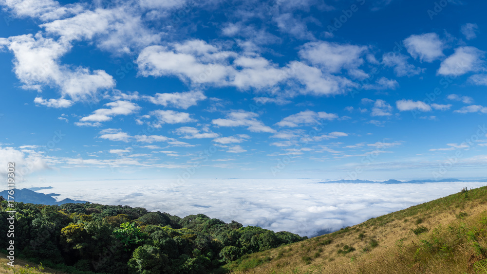 Mist over the mountains with blue sky background at doi inthanon. thailand