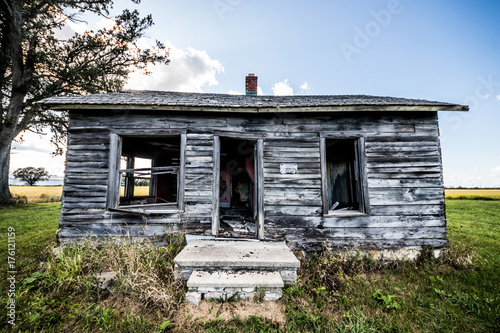 front of old abandoned house 