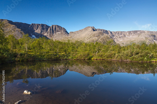 Mountain lake with clear water. Kola Peninsula , Khibiny . Russia.