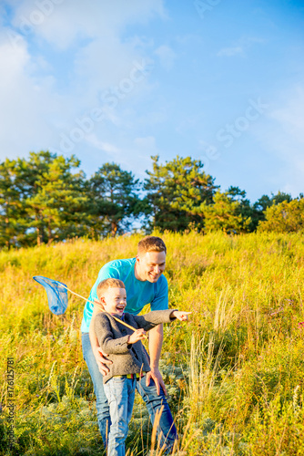 Happy family outside © Nichizhenova Elena