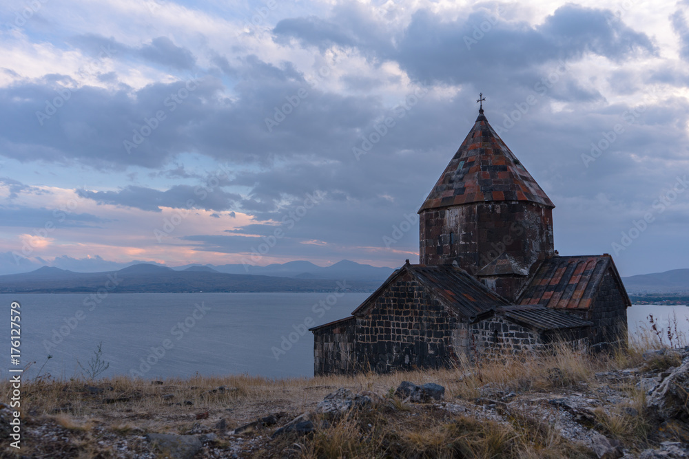 Twilight on Lake Sevan in Armenia and Monastery Twilight on Lake Sevan in Armenia and Monastery