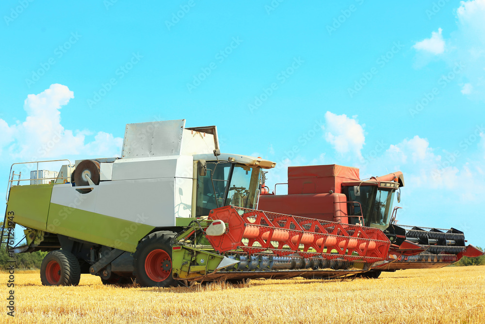 Two combine harvesters in field Two combine harvesters in field