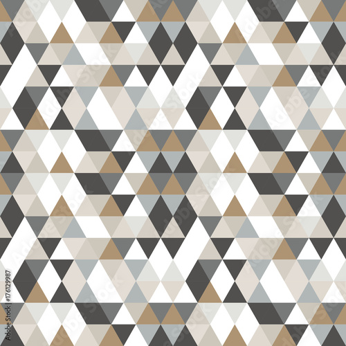 Geometric abstract pattern with triangles in muted retro colors.