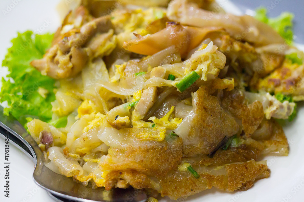 Stir fried flat noodle and chicken and egg Thai street food Stir fried flat noodle and chicken and egg Thai street food