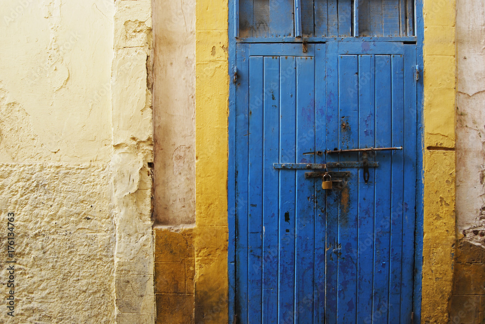 Rusty blue door in medina