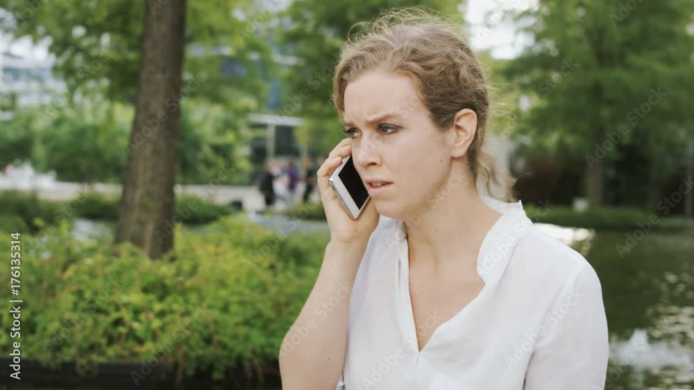 Businesswoman Starting a Phone Call and Drinking Coffee Businesswoman Starting a Phone Call and Drinking Coffee