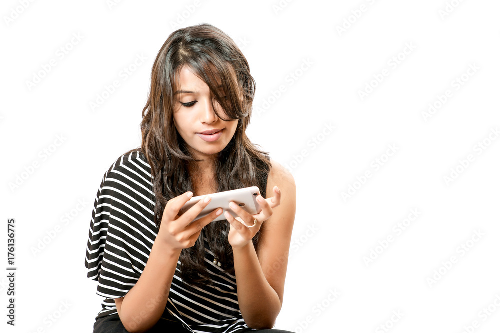 Indian young girl with smartphone Indian young girl with smartphone