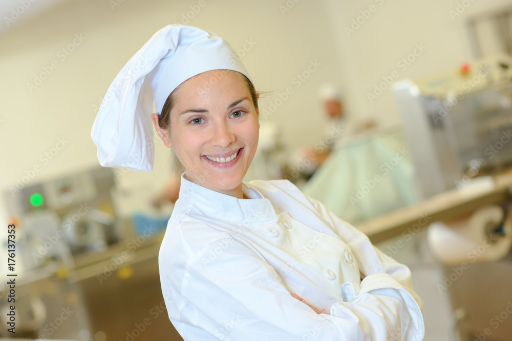 chef posing inside the kitchen chef posing inside the kitchen