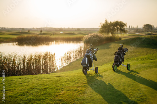 golf bags on green photo