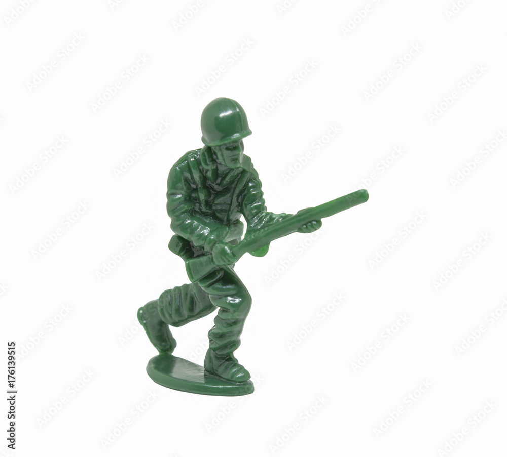 miniature toy soldier on white background; close-up miniature toy soldier on white background; close-up