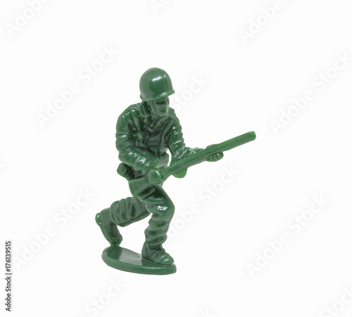 miniature toy soldier on white background; close-up