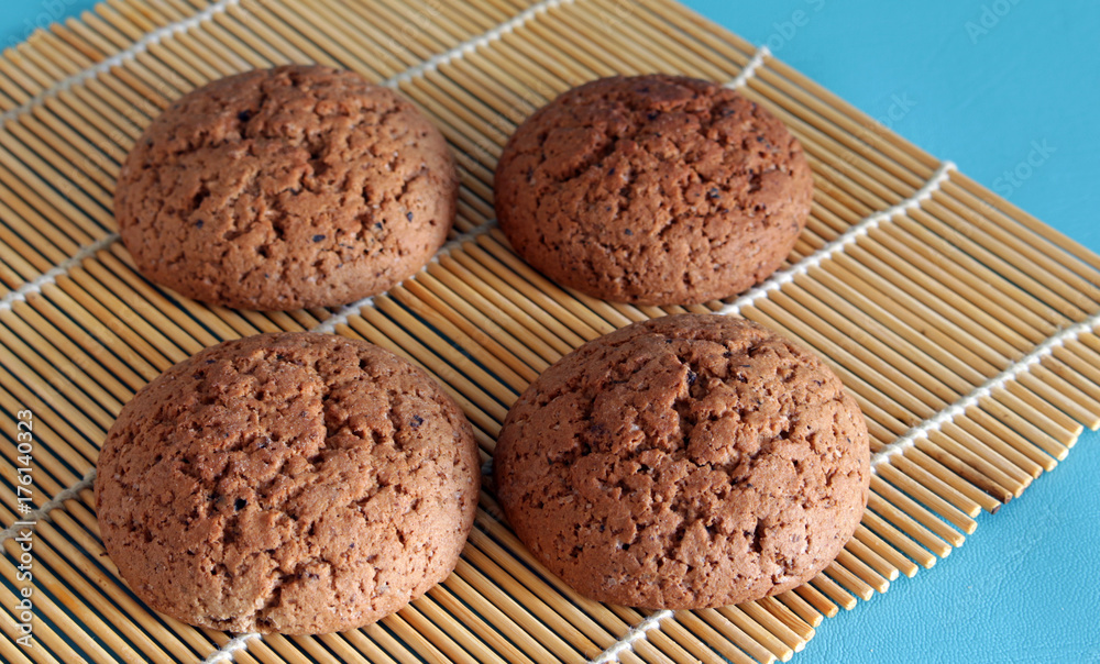 Fototapeta premium Four freshly baked homemade cookies on Makisa