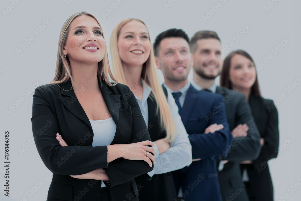 Team of successful and confident people posing on a white backgr Team of successful and confident people posing on a white backgr