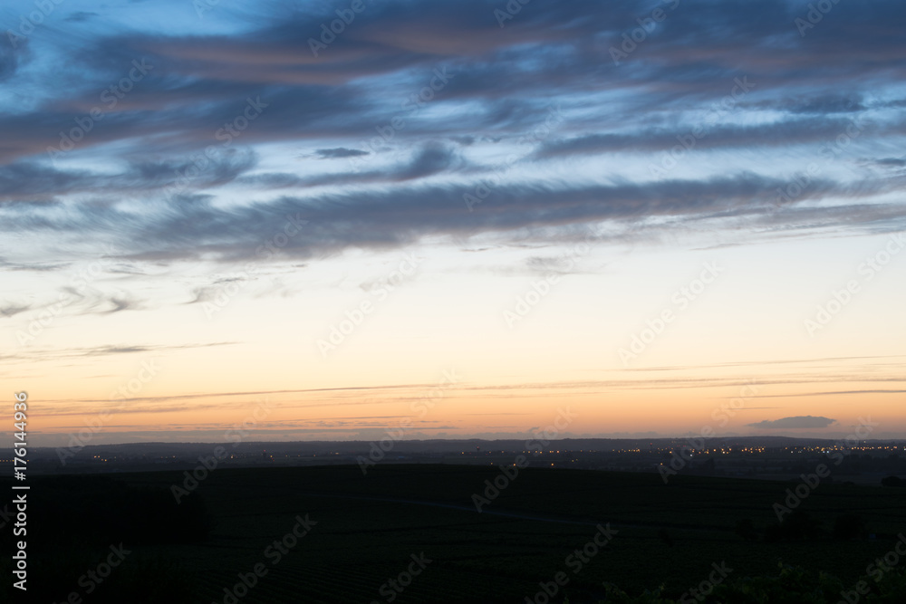 Blue hour with light trail in rural landscape