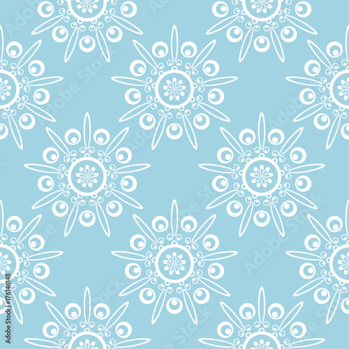 White floral seamless pattern on blue background