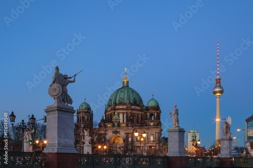 BERLIN, GERMANY - FEBRUARY 22, 2017: Beautiful view of historic Berlin Cathedral (Berliner Dom) at famous Museumsinsel (Museum Island) with awesome Schlossbrucke bridge at the foreground