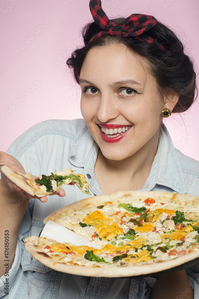 happy woman presents pizza on white background