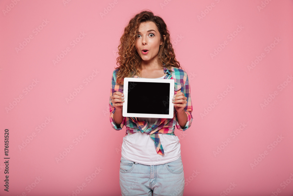 Cheerful lady showing tabler computer with blank screen isolated Cheerful lady showing tabler computer with blank screen isolated