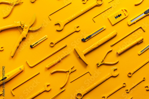 yellow work/handtools of a craftsman arranged. photo