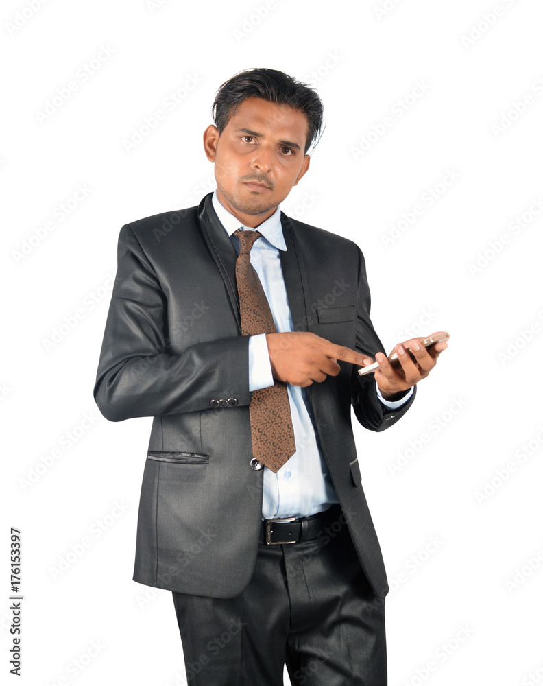 Businessman in black suit pointing on mobile screen over white background Businessman in black suit pointing on mobile screen over white background