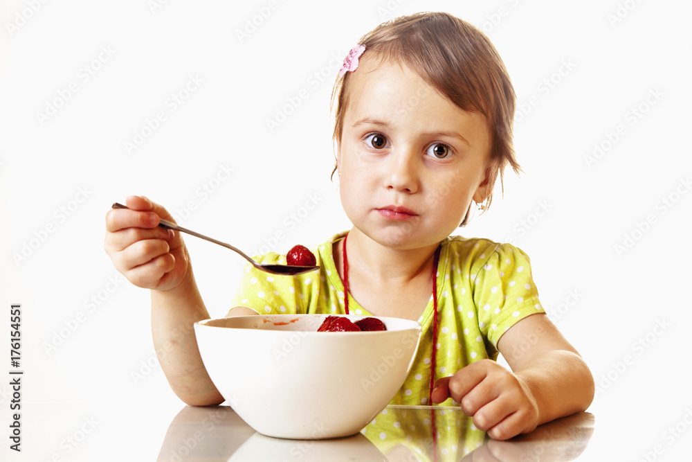A little beautiful baby girl eating fresh strawberries. (Health, Nutrition, Vitamins, Happy Childhood Concept) A little beautiful baby girl eating fresh strawberries. (Health, Nutrition, Vitamins, Happy Childhood Concept)