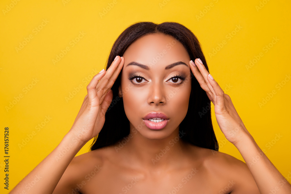 Perfection is a hard work! Pampering, pimple, wrinkle, clear and clean, oily, dry skin concept. Cose up cropped photo of afro gorgeous charming brunette touching gently her ideal face