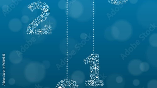 2018 text made of snowflakes on background with bokeh effect and enough copyspace for 

you text, each number slides from up or down on the chain of snowflakes