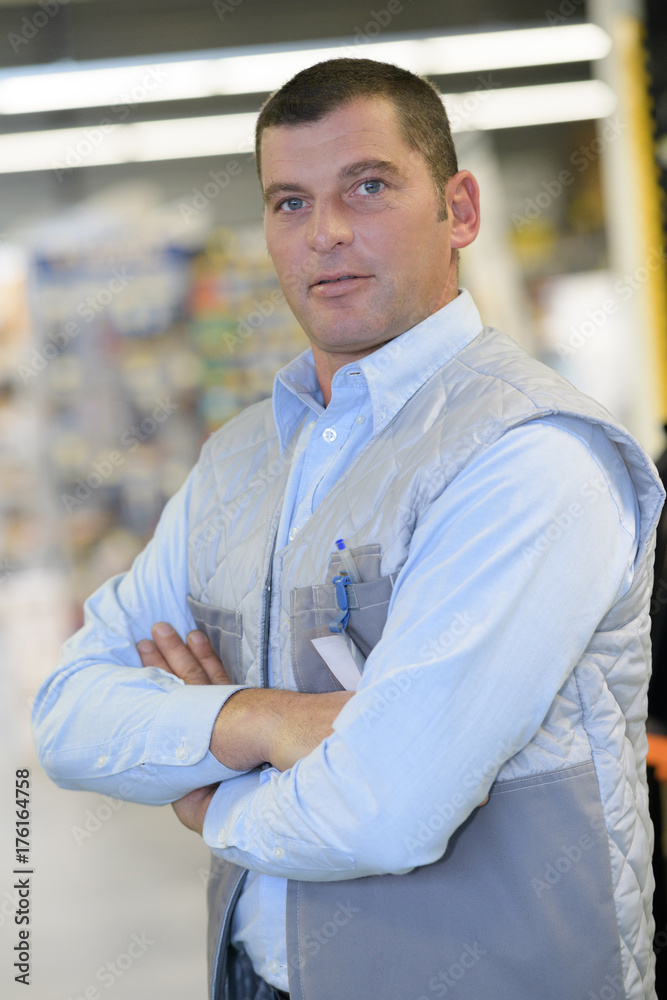portrait of caucasian hardware store salesman portrait of caucasian hardware store salesman