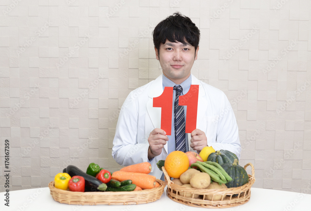 Fototapeta premium 数字を持つ男性