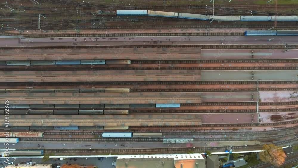Aerial view. Trains moving out from platform of railway station Aerial view. Trains moving out from platform of railway station