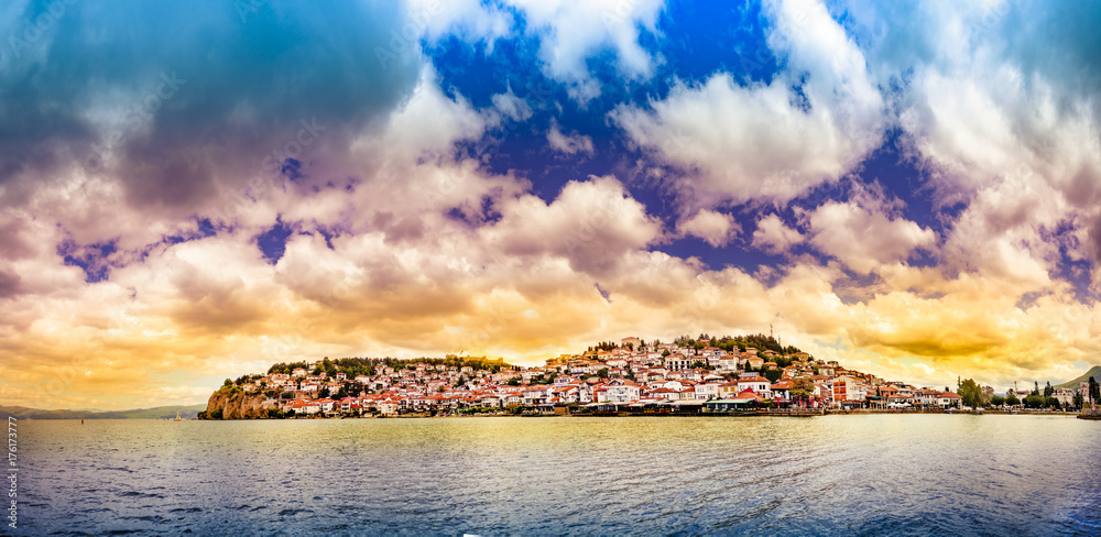 Naklejka premium Amazing beautiful panorama of Ohrid city and lake Ohrid during sunrise cloudy sky