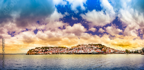 Amazing beautiful panorama of Ohrid city and lake Ohrid during sunrise cloudy sky photo