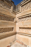 elaborate and intricate mosaic fretwork and geometric designs that cover tombs, panels, friezes and even entire walls at Mitla Mexico