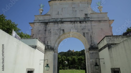 POV view of Pena Palace at hilltop, seen from Seteais Palace. Old Town of Sintra, Lisbon District, Portugal. Beautiful sunny day. Cultural Landscape of Sintra. photo