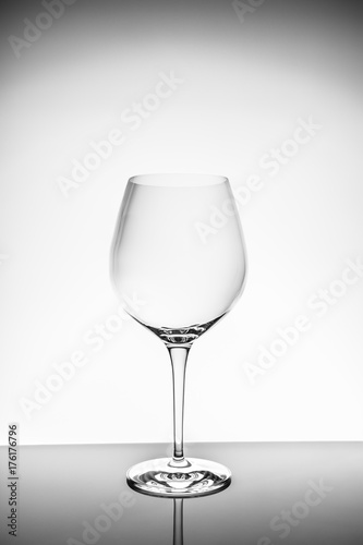 Red wine glass  on the light background
