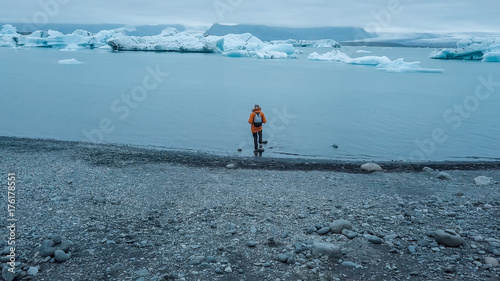 Tourists at Glacier Lagoon, Vatnajokull National Park, Iceland. photo