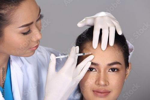 Beautician Doctor Check Diagnose Face structure patient before plastic surgery
