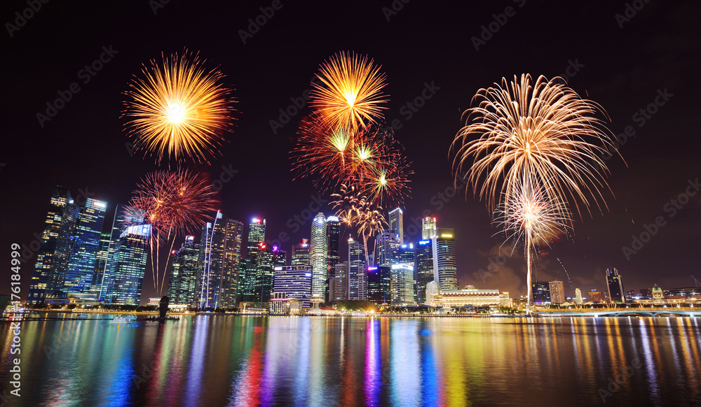 firework over central business district building of Singapore city at night firework over central business district building of Singapore city at night