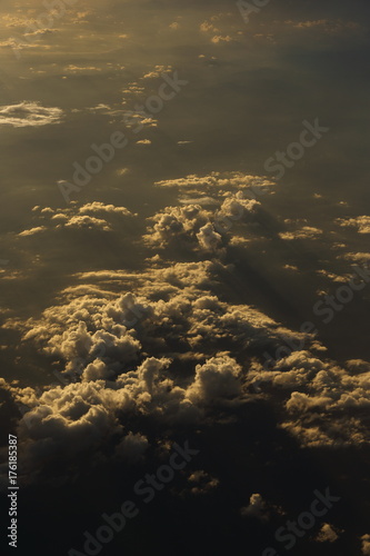 Sunset White Cloud sky at high level attitude, view from window airplane