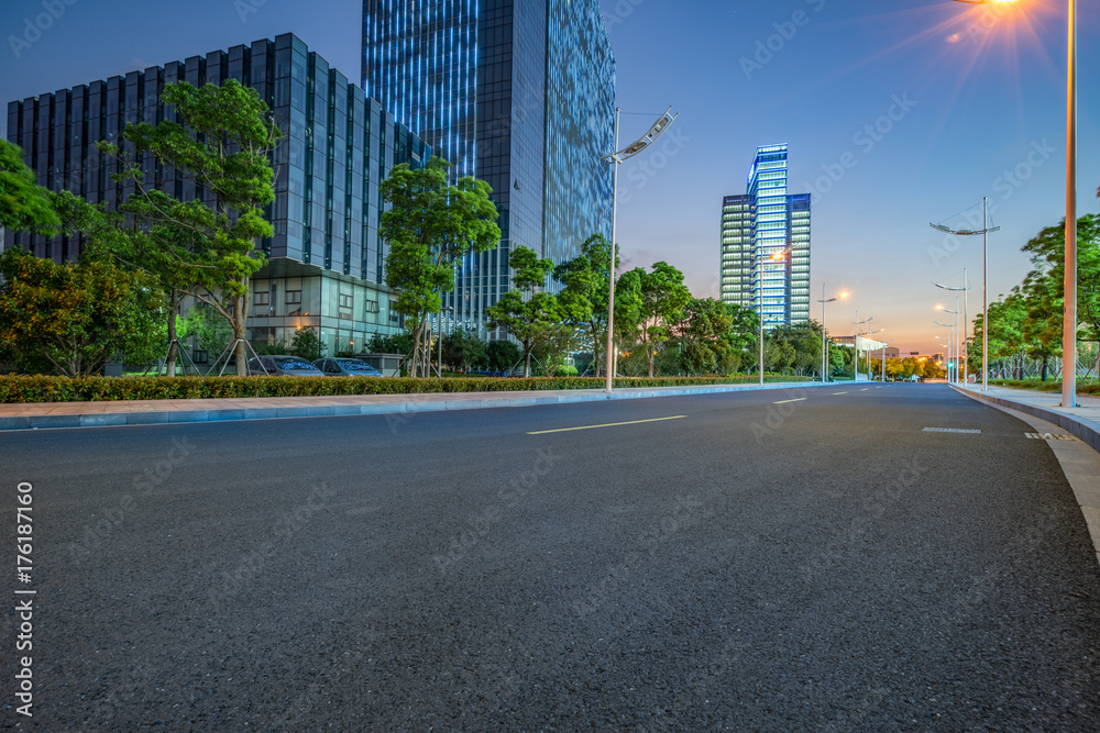 clean asphalt road through office block area, suzhou, china. clean asphalt road through office block area, suzhou, china.